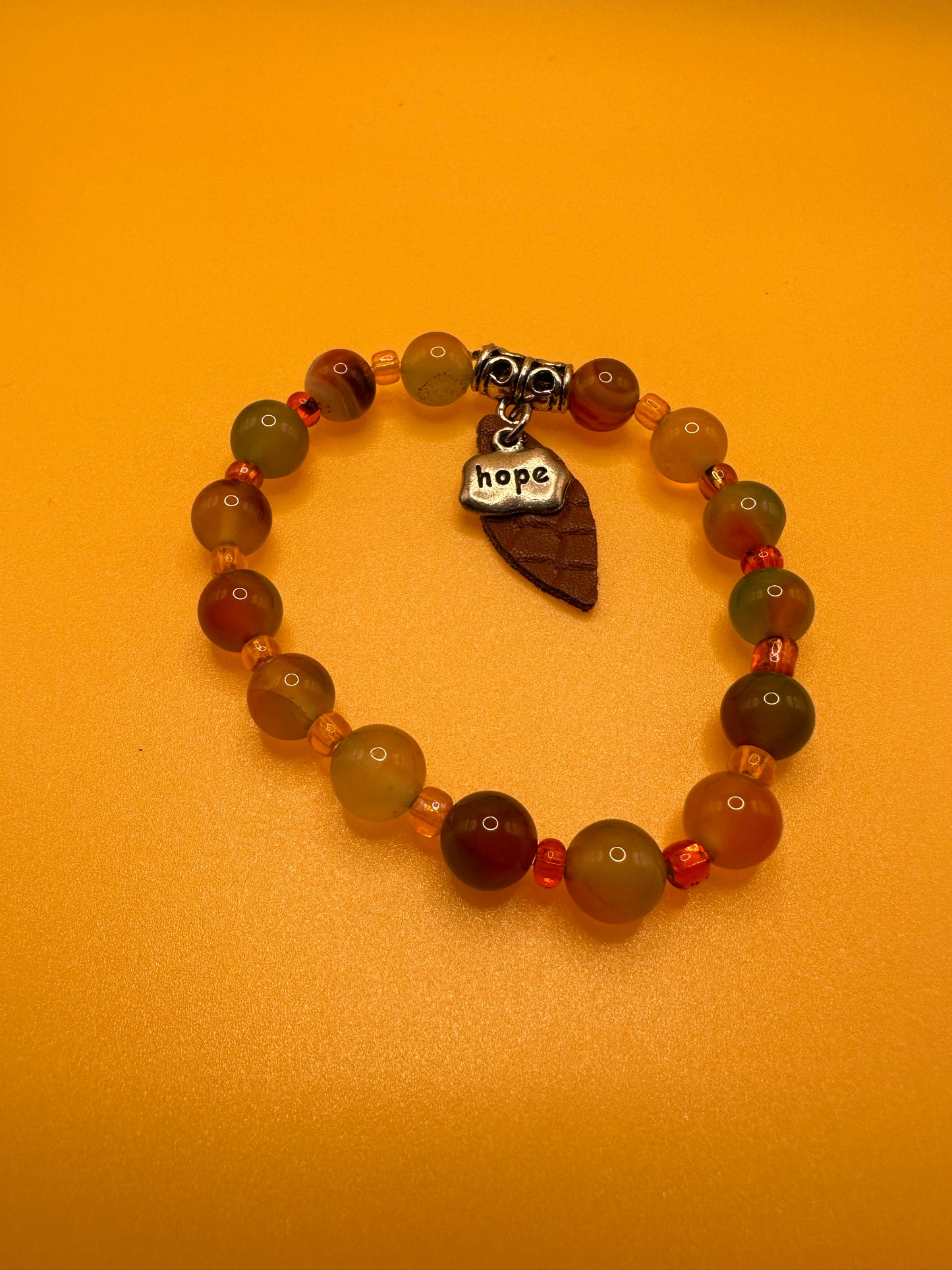 Stretch bracelet featuring 8mm Picture Jasper natural semi precious stones.