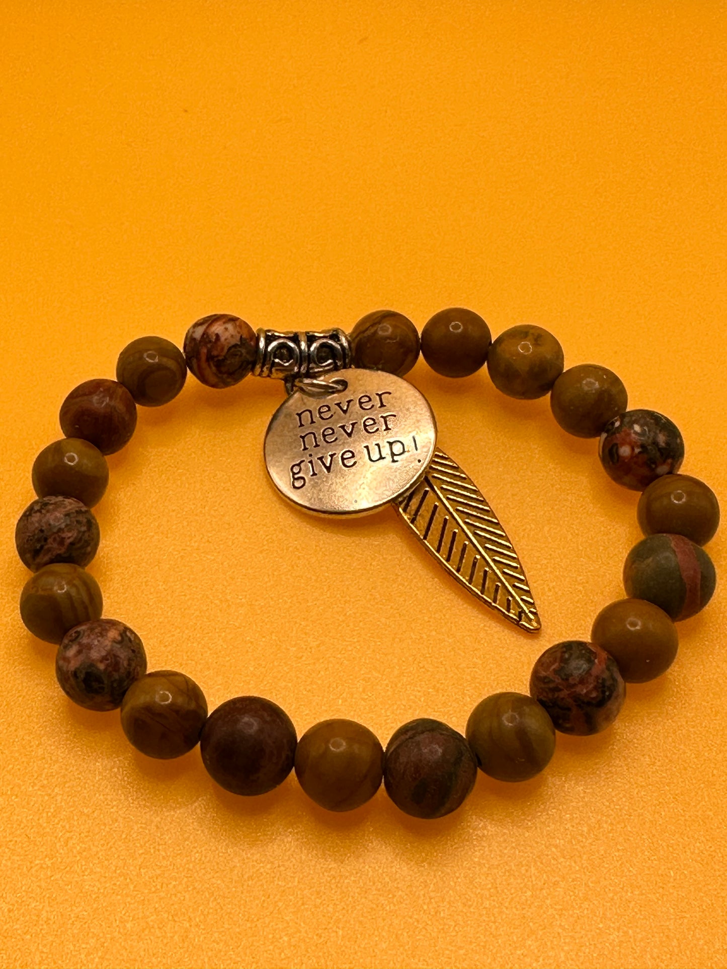 Stretch bracelet featuring 8mm Picture Jasper natural semi precious stones.