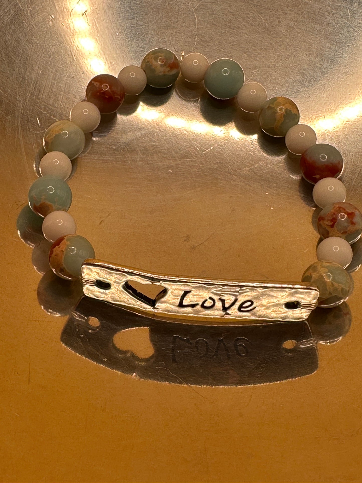 Stretch Bracelet featuring Shoushan and White Natural Stones with "Love" accent plate.