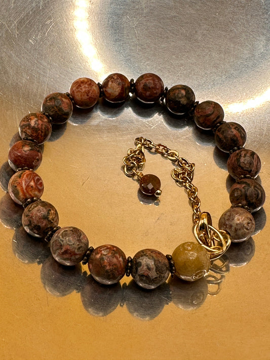 Memory wire bracelet featuring natural Red Leopard Jasper gemstones.