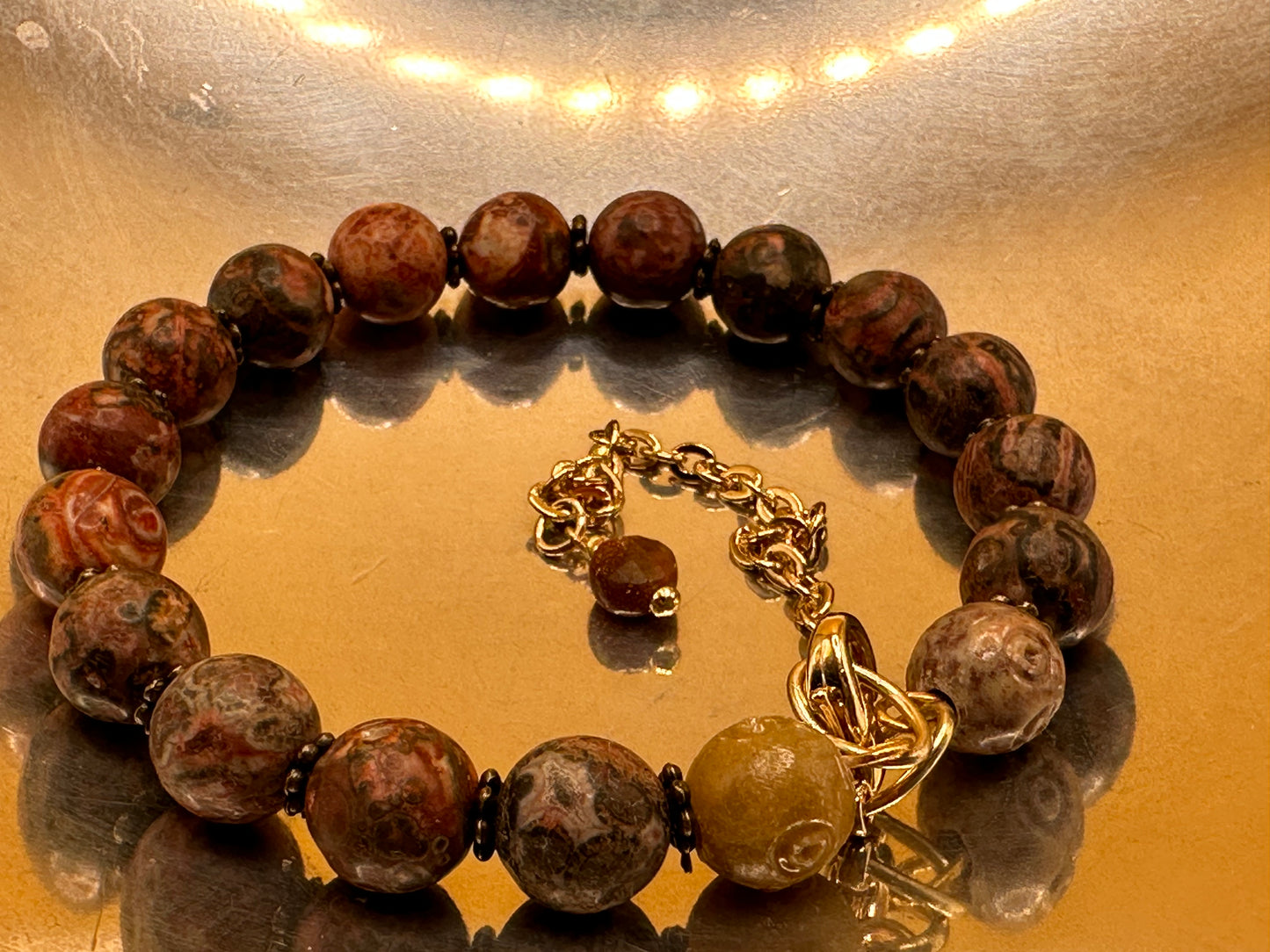 Memory wire bracelet featuring natural Red Leopard Jasper gemstones.