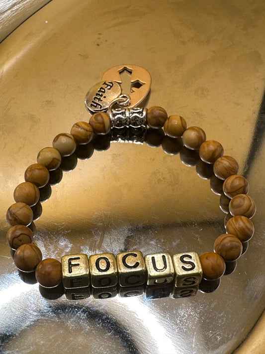 Wood Jasper Semi-precious 6mm beads Stretch Bracelet with gold toned "Focus" and Faith/Cross charms.