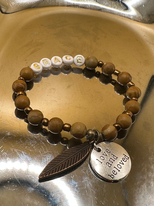 Wood Jasper stretch Bracelet with copper toned spacer beads. "Grace" gold/white tone beads with leaf and "Love and Be Loved" charms.