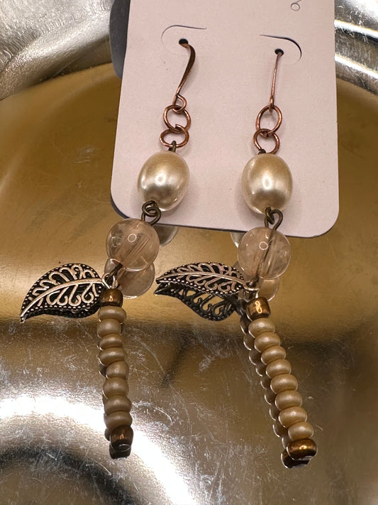 Copper ear wire Peach and Cream Earrings with small leaf charm.